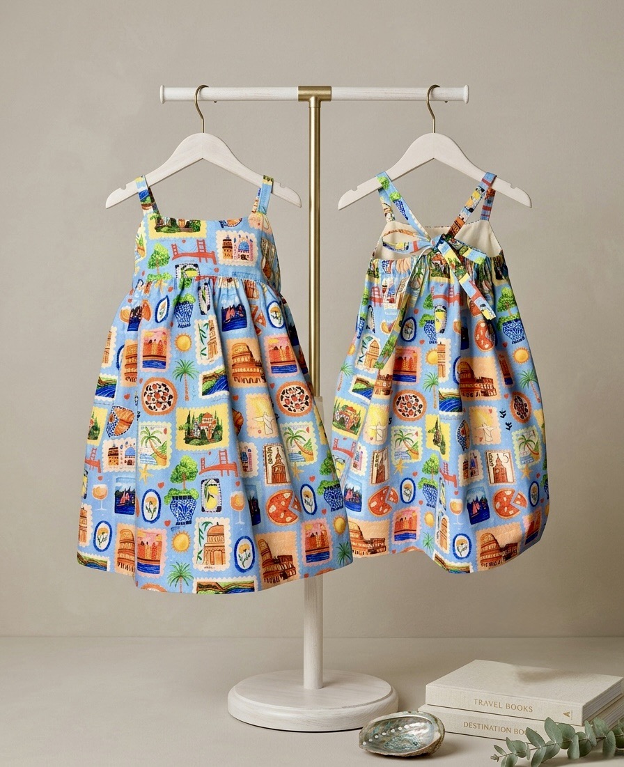Hello World Sienna Sun Dress - organic cotton sundress with hand-painted travel stamp print